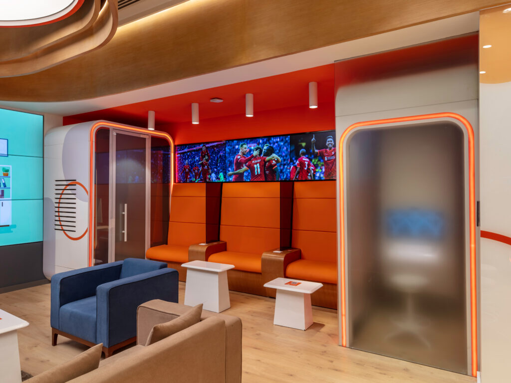 Digital banking branch design with consultation areas and open layout.